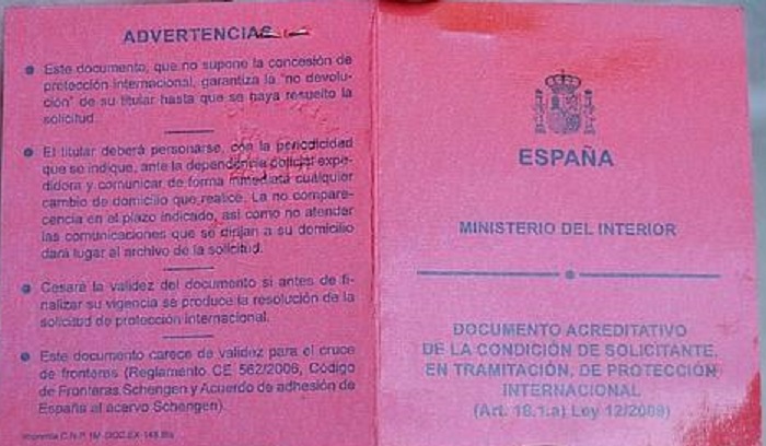 What is the red card in the asylum procedure in Spain